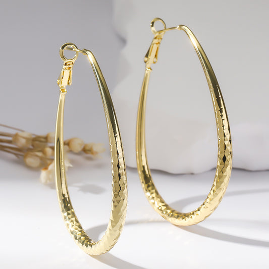 Golden Glossy Spring Fastener Egg-shaped Earrings
