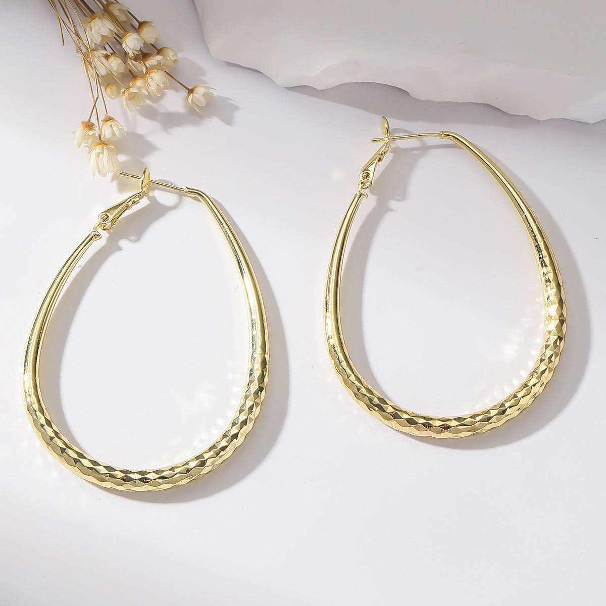 Golden Glossy Spring Fastener Egg-shaped Earrings
