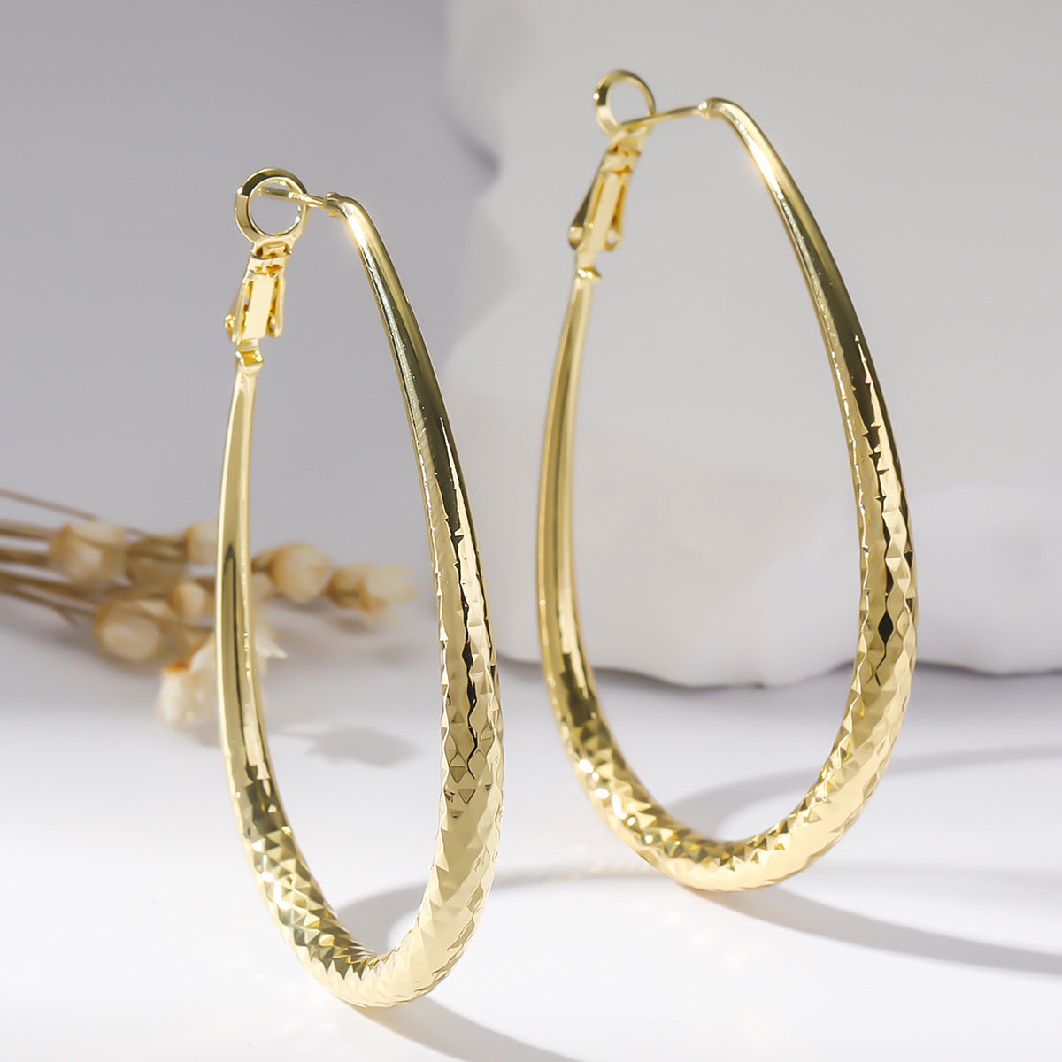 Golden Glossy Spring Fastener Egg-shaped Earrings