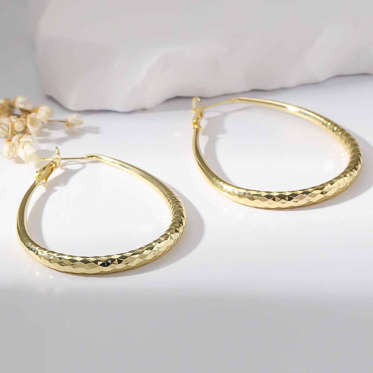 Golden Glossy Spring Fastener Egg-shaped Earrings